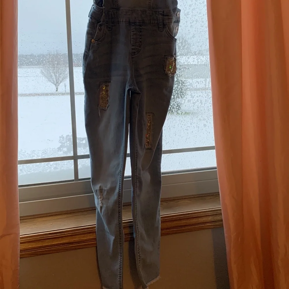 This is a Justice Romper/Jumpsuit, has sequence for holes. - Picture 3 of 6